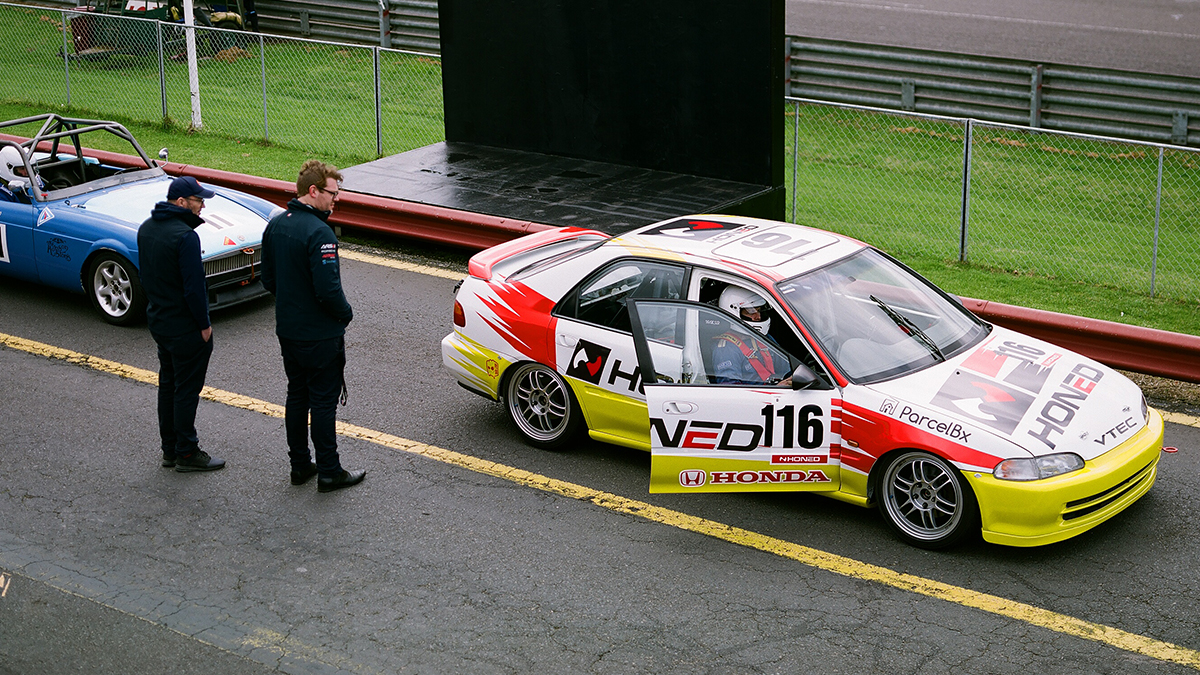 Honda Civic Sedan race car in Sandown pit lane